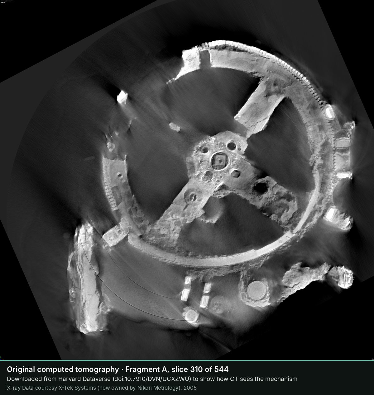Slice 310 of the CT scan of Fragment A: The main wheel b1, with its four spokes and central hub.