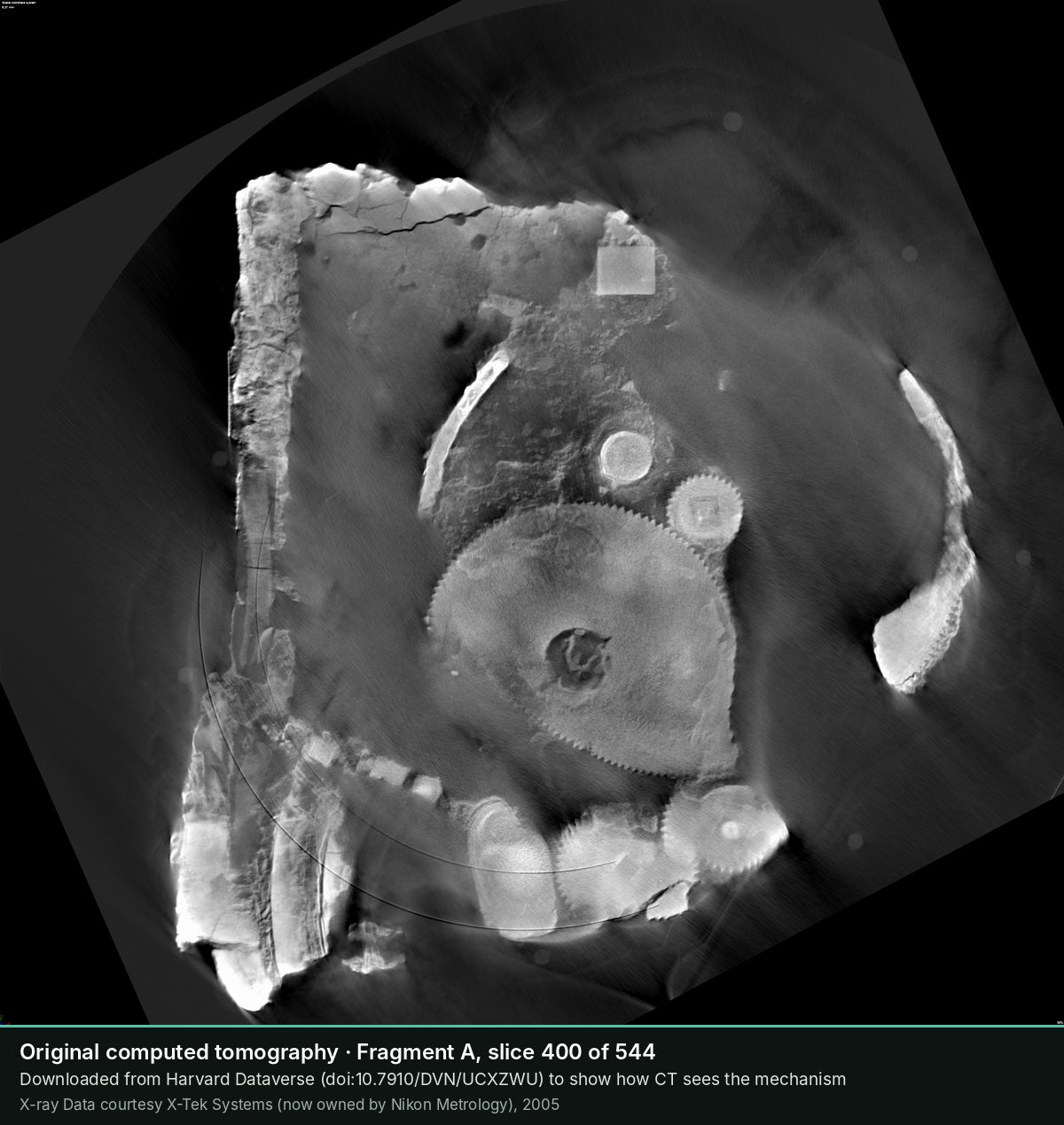 Slice 400 of the CT scan of Fragment A: A large, finely toothed wheel, with a small gear meshing with it.